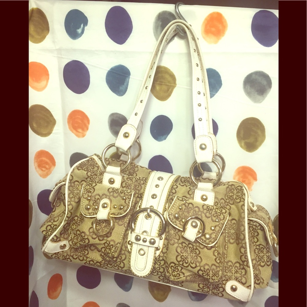 Kathy bag in tan w white trim & brass hardware.